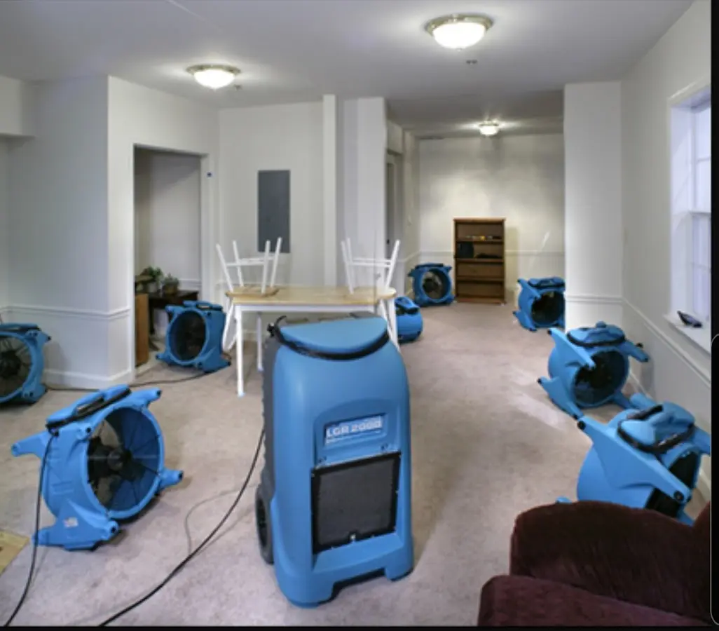 Air movers and dehumidifier setup for Water Damage Restoration in Westminster